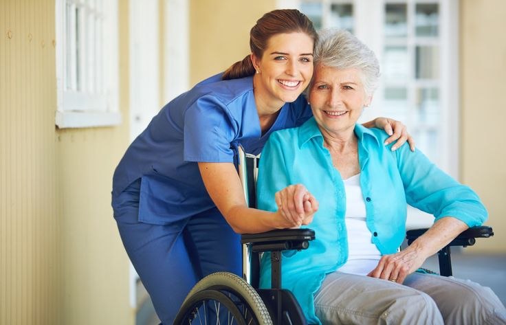 Carer supporting a client at home